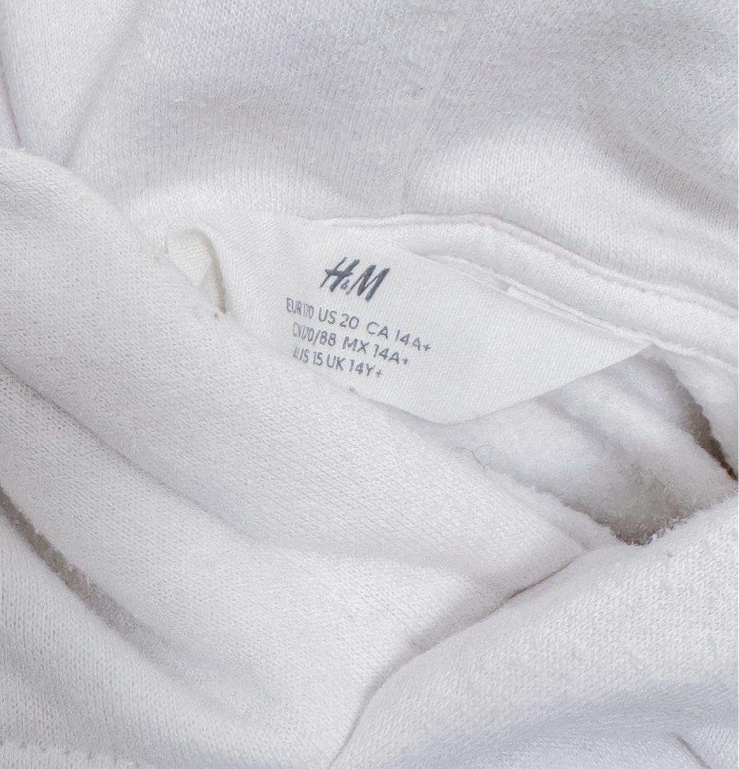 H&M White NASA Hoodie (Category: Hoodies) located in Manila. Submitted by jemmmandes (Listing ID 1460561313, Image 3). Description: - White hoodie by H&M - with ballpen marks.