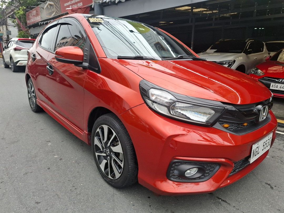 Honda Brio rs Auto (Category: Used Cars) located in Manila. Submitted by rammie.bullicer (Listing ID 1460559865, Image 2). Description: 🚘 HONDA BRIO RS 2021s 🚘 ‼️495k (negotiable)‼️ ✔️ Top of the Line ✔️ Automatic Transmission ✔️ 24k Mileage only ✔️ Leather Seat Cover ✔️ Bnew Deep dish Matting ✔️ Bnew Trunk Tray ✔️ Bnew Wide Rear Mirror ✔️ Matte Black Garnish ✔️ All Original ✔️ All Stock ✔️ Sun/Rain Visor ✔️you can bring your trusted mechanic ✔
