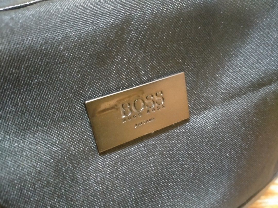 HUGO BOSS POUCH BAG (Category: Belt bags, Clutches and Pouches) located in Cabuyao City. Submitted by Bike_Clothing10 (Listing ID 1460507710, Image 2). Description: READ FIRST.. FOR SALE: HUGO BOSS POUCH BAG Excellent Condition Looks New Leather Strap Legit PRICE: 1200 Free Shipping (J&T) PICK UP OR SHIPPING ONLY LOCATION: Cabuyao Laguna -NO COD/COP- Courier: J&T Mop: Gcash PM FOR INQUIRIES.....