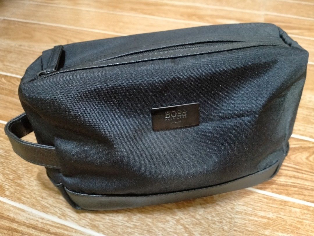 HUGO BOSS POUCH BAG (Category: Belt bags, Clutches and Pouches) located in Cabuyao City. Submitted by Bike_Clothing10 (Listing ID 1460507710, Image 1). Description: READ FIRST.. FOR SALE: HUGO BOSS POUCH BAG Excellent Condition Looks New Leather Strap Legit PRICE: 1200 Free Shipping (J&T) PICK UP OR SHIPPING ONLY LOCATION: Cabuyao Laguna -NO COD/COP- Courier: J&T Mop: Gcash PM FOR INQUIRIES.....
