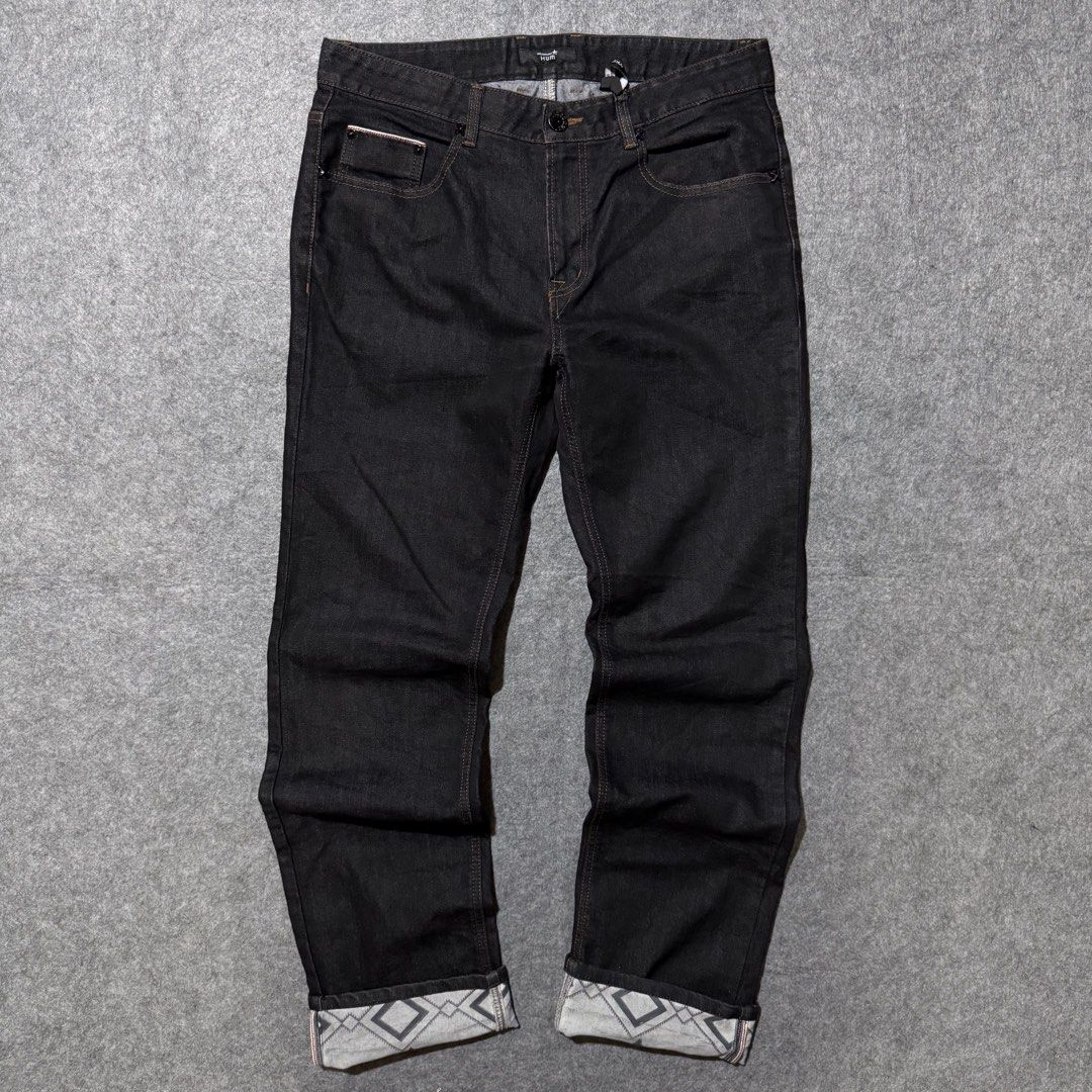 Hum selvedge panta (Category: Jeans) located in Zamboanga. Submitted by arganhadjula28 (Listing ID 1460631453, Image 1). Description: black denim jeans featuring distinctive geometric patterned cuffs and a cinch-back adjuster. Waistline 34 Length 45 Hem 8.