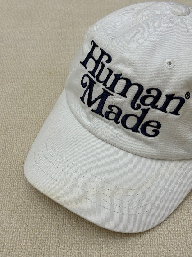 Human Made White Cap (Category: Caps & Hats) located in Manila. Submitted by porma.market (Listing ID 1460518841, Image 1). Description: - White Human Made dad hat - Navy blue embroidery - Classic dad hat style - Plenty of life left, great for casual wear - Minimal flaws ( still presentable ) - Authentic .
