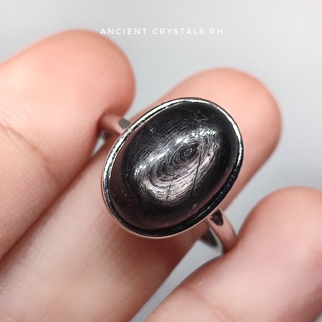 Hypersthene Ring ~ “Aura” 🖤 (Category: Rings) located in Makati City. Submitted by ancientph (Listing ID 1460666564, Image 3). Description: Hypersthene Ring ~ “Aura” 🖤 From the Power Within Collection Good for: -Enhances grounding -Boosts intuition -Soothes anxiety -Promotes clarity °•°•°•°•°• Type: Adjustable ring from size 4-8 Material: silver plated alloy Color: silver Price: 400 Mode of Payment: Gcash, Maribank, Unionbank, BPI Courier: Move