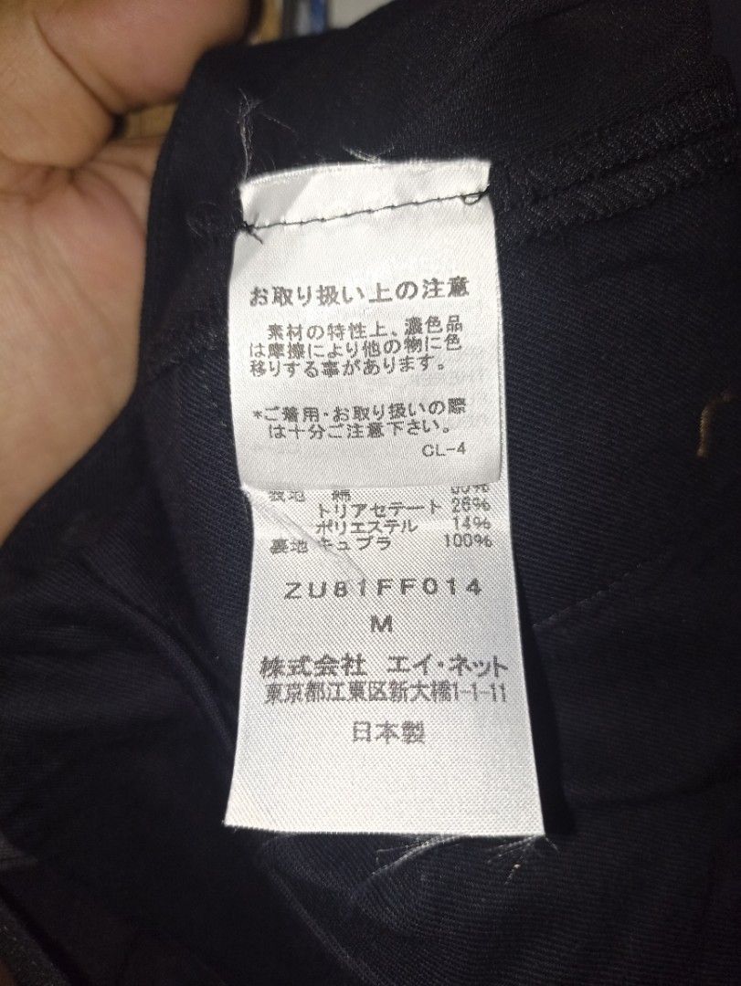 ISSEY MIYAKE "ZUCCA" (Category: Other Bottoms) located in Davao. Submitted by anythin6 (Listing ID 1460653551, Image 2). Description: - Classic black trousers from Zucca - Features a button closure for a secure fit - Two functional pockets on the back - Perfect for both casual and smart occasions.