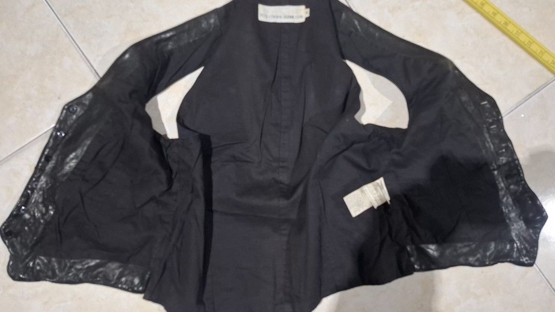 Izzue leather vest (Category: Coats, Jackets and Outerwear) located in Baguio. Submitted by thriftrot (Listing ID 1460511187, Image 3). Description: izzue leathers learher and nylon combination no issue in very good condition small L21 w18 loc. baguio add shipping fee .