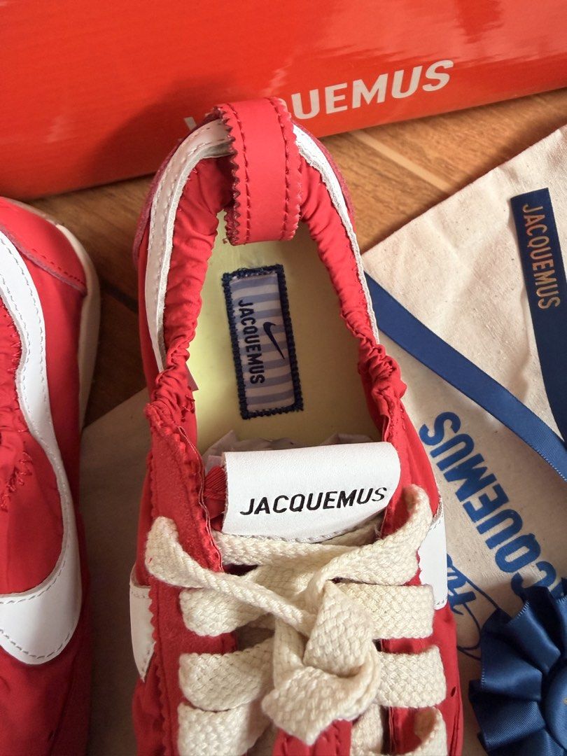 Jacquemus x Nike with Box and Dust Bag (Category: Sneakers) located in Las Pinas. Submitted by twiceloved24 (Listing ID 1460558936, Image 2). Description: - Unique Jacquemus branding on heel and tongue - Distinctive sole pattern for a statement look - Ideal for collectors or fashion enthusiasts.