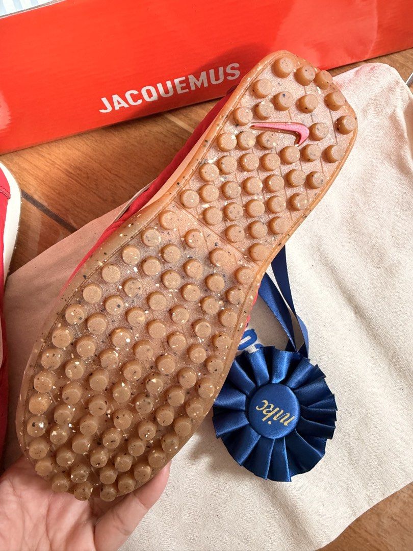 Jacquemus x Nike with Box and Dust Bag (Category: Sneakers) located in Las Pinas. Submitted by twiceloved24 (Listing ID 1460558936, Image 3). Description: - Unique Jacquemus branding on heel and tongue - Distinctive sole pattern for a statement look - Ideal for collectors or fashion enthusiasts.