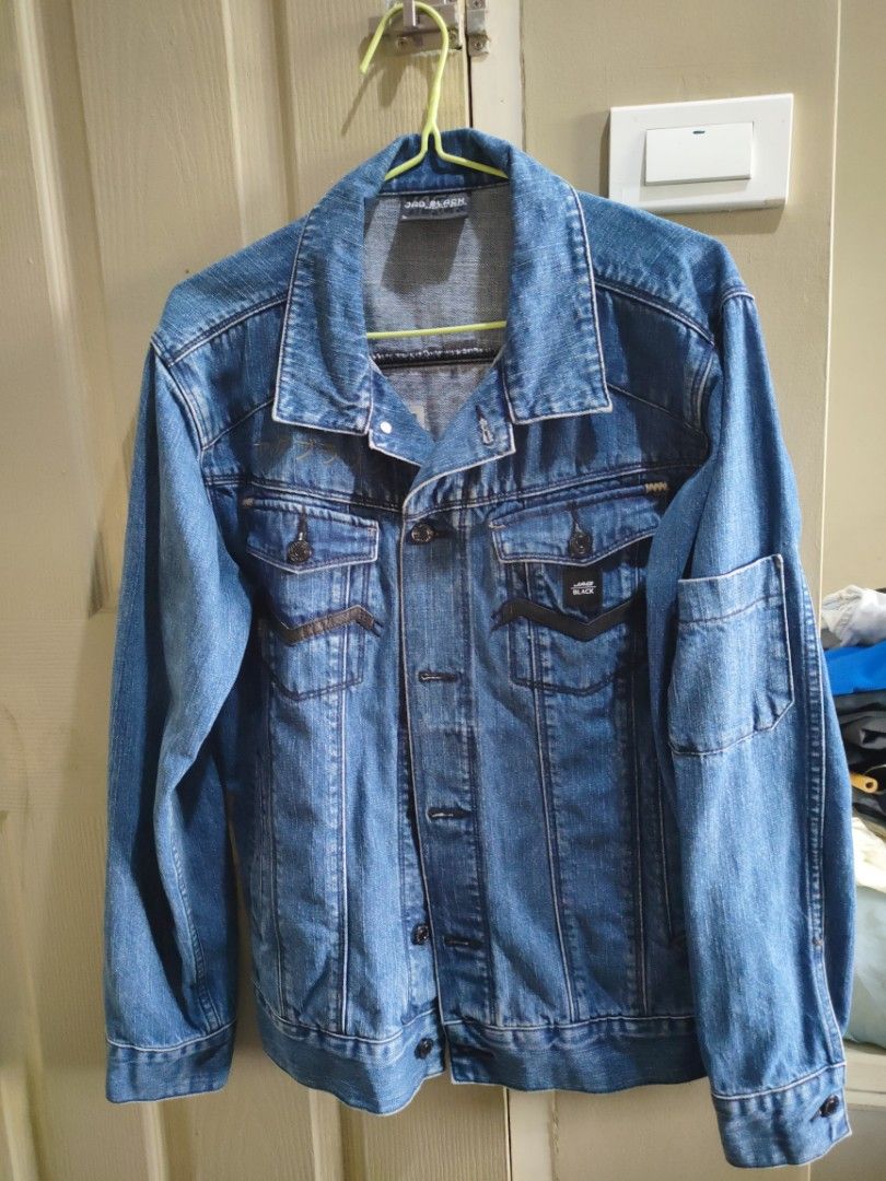 JAG BLK Premium Brand Denim Jacket (Category: Coats, Jackets and Outerwear) located in Manila. Submitted by robertjust66965 (Listing ID 1460515075, Image 1). Description: - Classic blue denim jacket - Brand: JAG BLK - Size: L - Button-up front - Chest pockets - Unique Japanese text detail on the back - Ideal for layering.