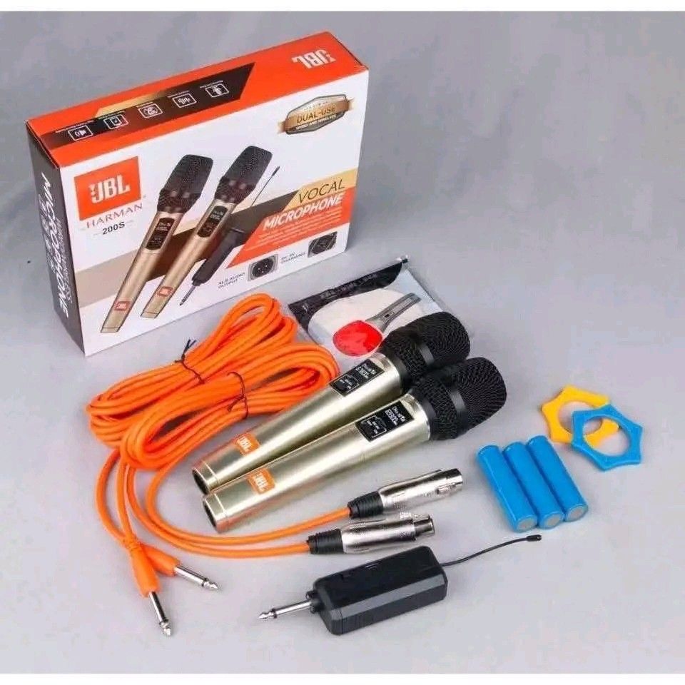 JBL Harman 2005 Dual-Use Vocal Microphone Set (Category: Microphones) located in Manila. Submitted by marvieobordo (Listing ID 1460520390, Image 2). Description: - Set of 2 JBL Harman 200svocal microphones - Includes cables, receiver, and batteries - Dual-use capability for karaoke or performances - Orange cables included.