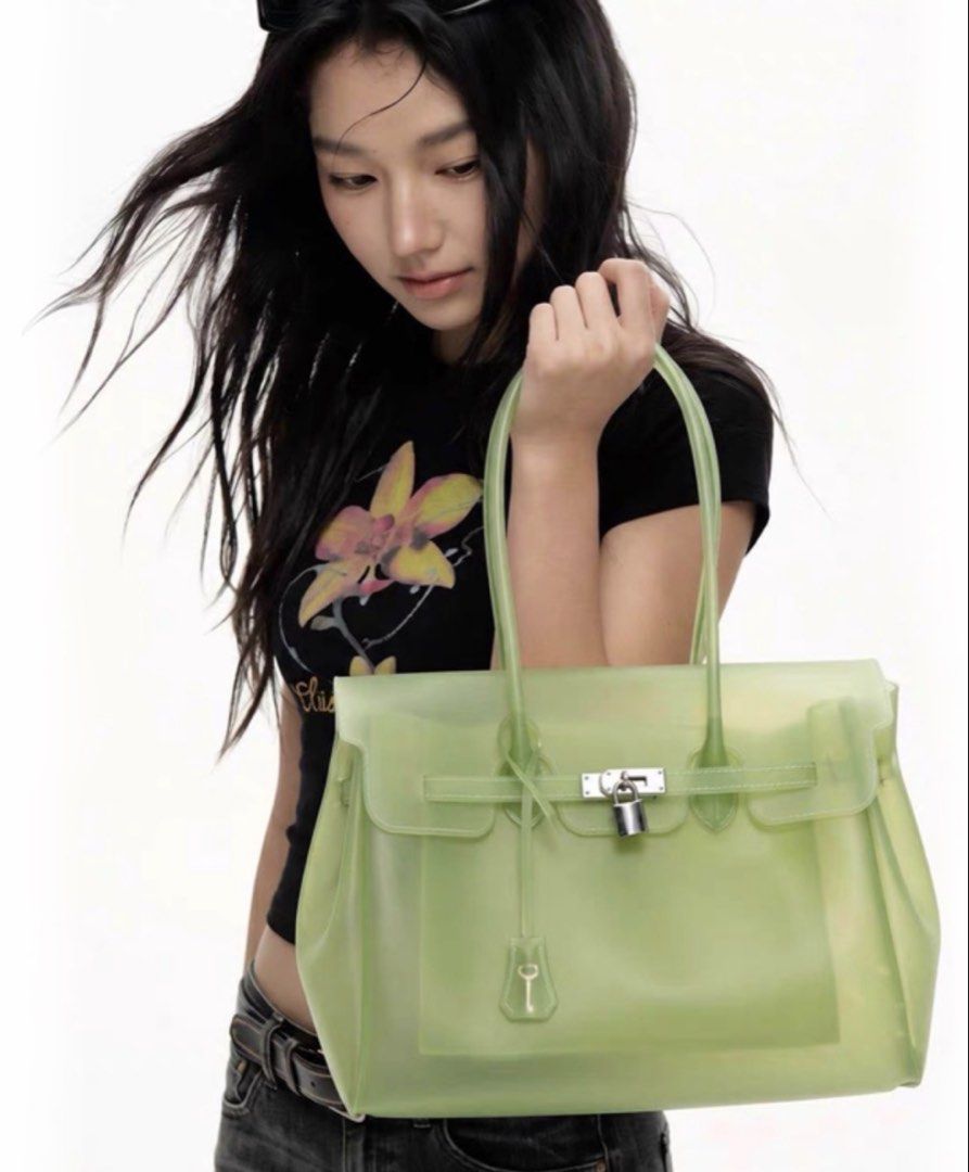 Jelly Firkin - Green (Category: Luxury Bags & Wallets) located in Quezon City. Submitted by lexitheshopper (Listing ID 1460688874, Image 3). Description: Complete with lock, key and clochette Birkin inspired bag without breaking the bank ✨ for interested buyers, feel free to ask for actual / more photos Im from QC so I can also ship it same day via lalamove (paid by buyer) .