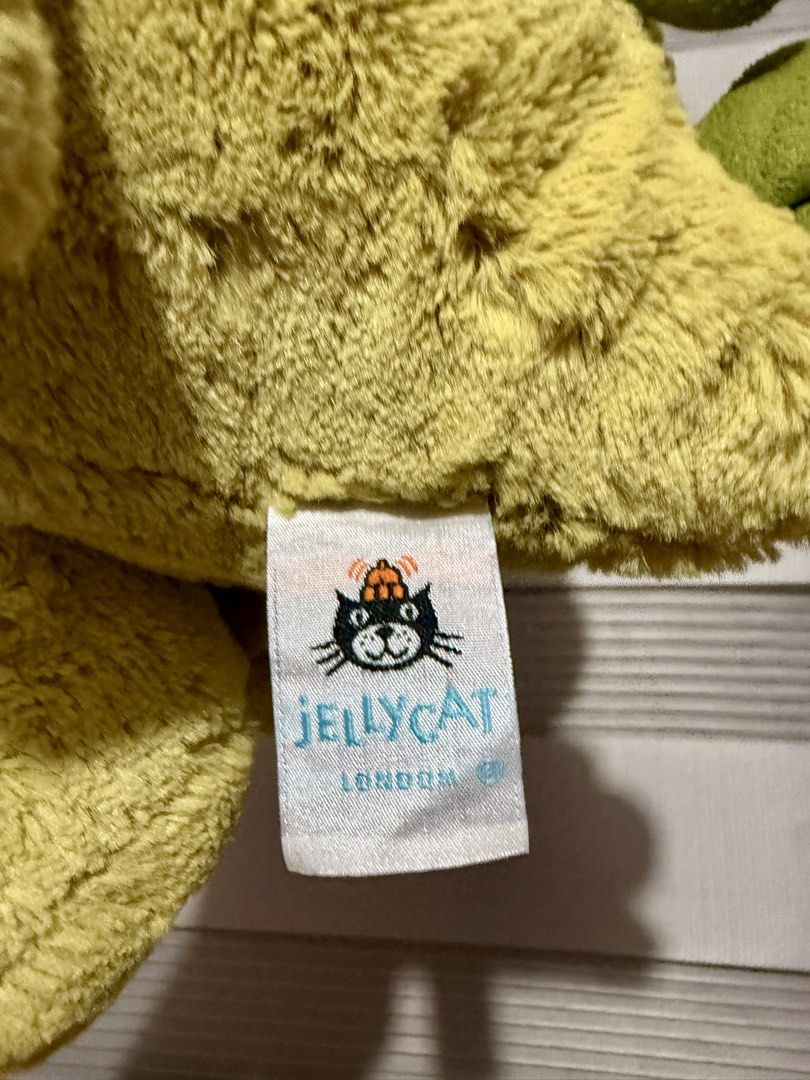 Jellycat Bashful Dino Medium (Category: Plushies & Soft Toys) located in Manila. Submitted by bcbg3217 (Listing ID 1460700520, Image 3). Description: ‼️PLEASE READ BEFORE BUYING‼️ Like new condition Medium size Super soft fur Authenticity NOT guaranteed (Please do your own checking too) No other jellycat inclusions Actual photos are posted No other issues or flaws unless stated Please check the photos thoroughly before placing an order JnT regula