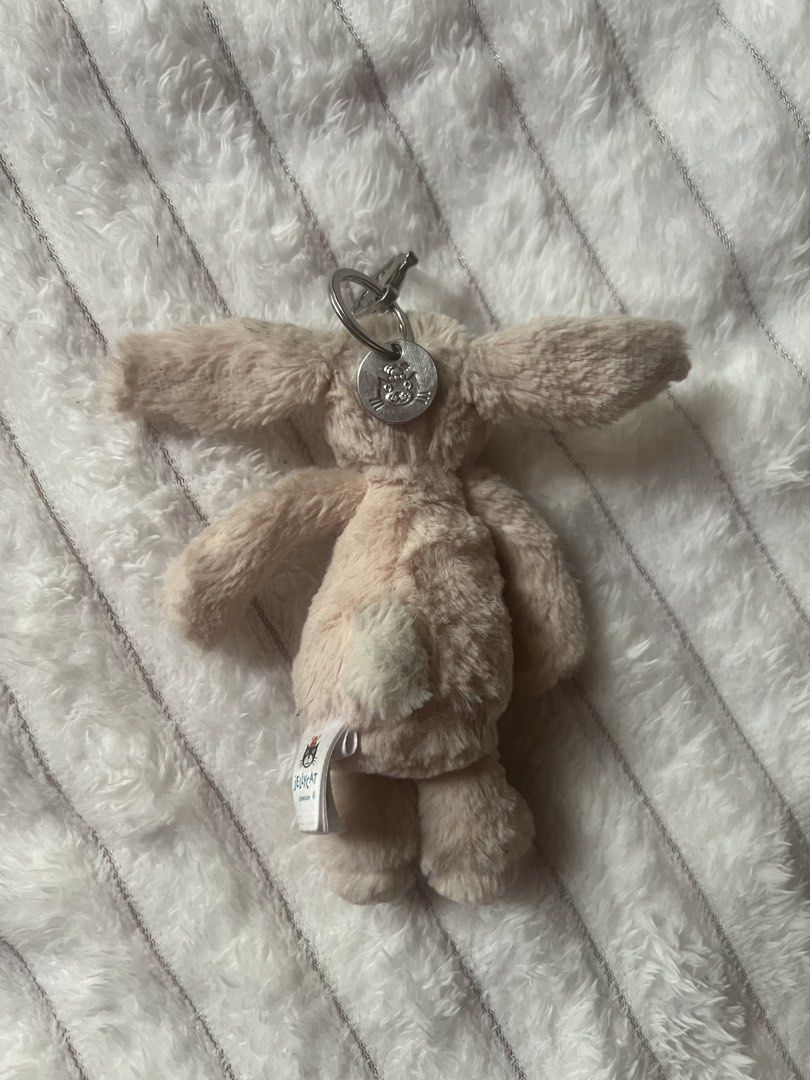 jellycat pink bunny keychain (Category: Plushies & Soft Toys) located in Pasig City. Submitted by snoopeaa (Listing ID 1460596208, Image 2). Description: the jellycat is a but dirty but easily washable. .