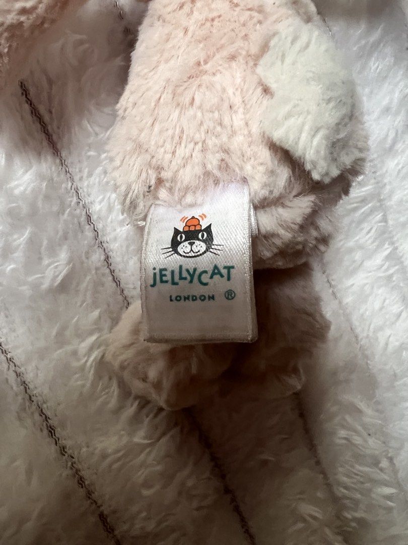 jellycat pink bunny keychain (Category: Plushies & Soft Toys) located in Pasig City. Submitted by snoopeaa (Listing ID 1460596208, Image 3). Description: the jellycat is a but dirty but easily washable. .