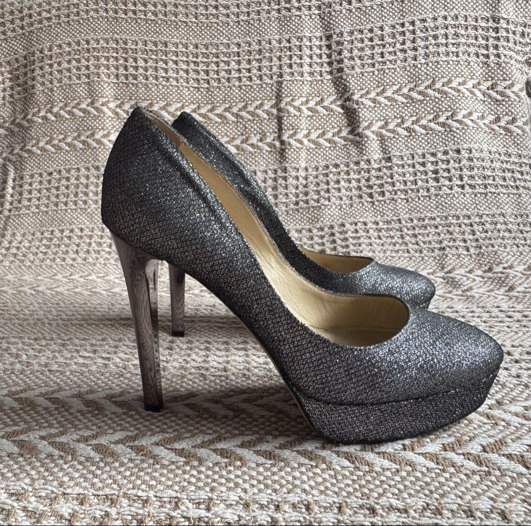 JIMMY CHOO Platform pumps, Size 6 (23cm) (Category: Heels) located in Manila. Submitted by heeasaiao (Listing ID 1460629315, Image 2). Description: Jimmy Choo glittery platform pumps with a sleek rounded toe, metallic high stiletto heel, and elevated platform sole. DETAILS Brand: Jimmy Choo Color: Silver Style: Platform Pumps Size: 35.5 (on shoe) : 23cm (measured) Metallic Silver High Stiletto Heel Platform Sole Made in Italy worn sole and light 