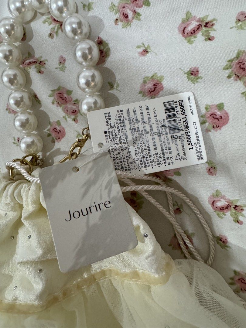 Jourire Pearl Handle Drawstring Bag (Category: Shoulder Bags) located in Paranaque City. Submitted by monduffcloset (Listing ID 1460701847, Image 2). Description: • Brand new from Japan • original price ₱610 • features pocket inside and draw string closure TAGS ♡♡♡ .
