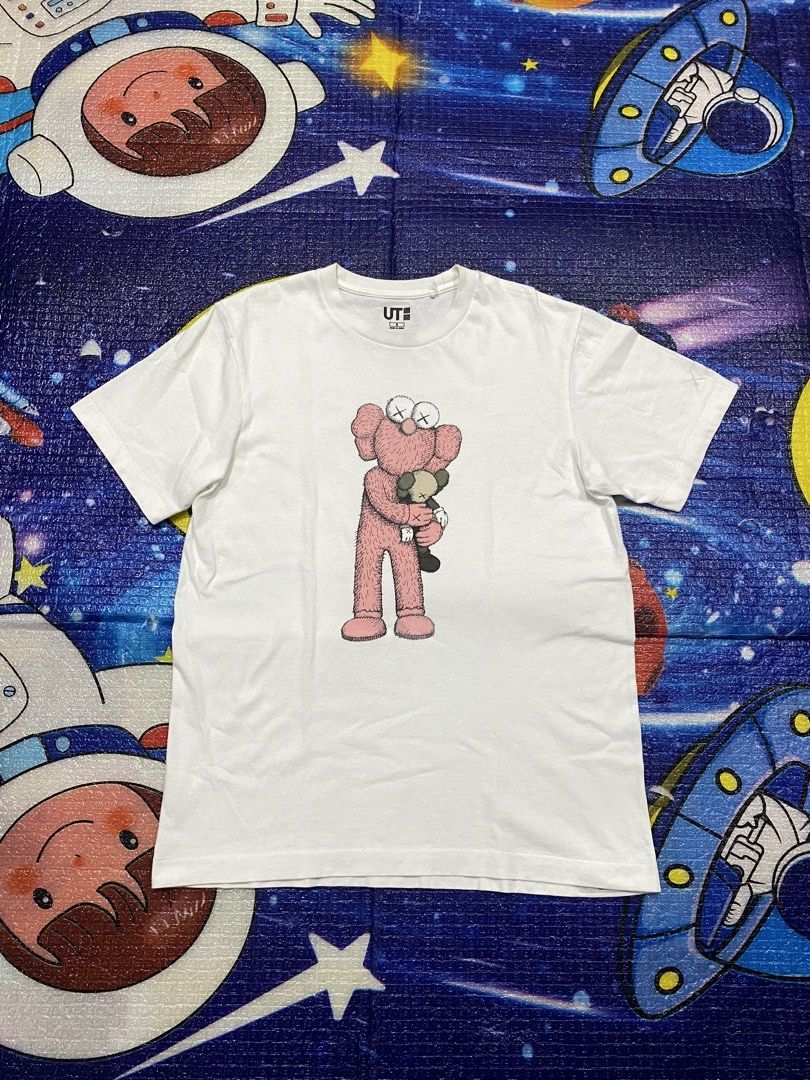 KAWS x Uniqlo Pink BFF Tee (Category: Tshirts & Polo Shirts ) located in Maasin. Submitted by regain_cycle17 (Listing ID 1460690888, Image 1). Description: KAWS x Uniqlo Pink BFF Tee S on tag (Can fit up to Medium size)✅ Excellent condition to as new🔥 21W x 27L 10/10 color rate🤍 super white No hidden issues/flaws❌ Washed and ready to wear♻️ Color may vary due to lights❗️ 450 plus shipping fee✈️💰 MOP: GCash📥 STRICTLY PAYMENT FIRST❗️ 📍SOUTHERN
