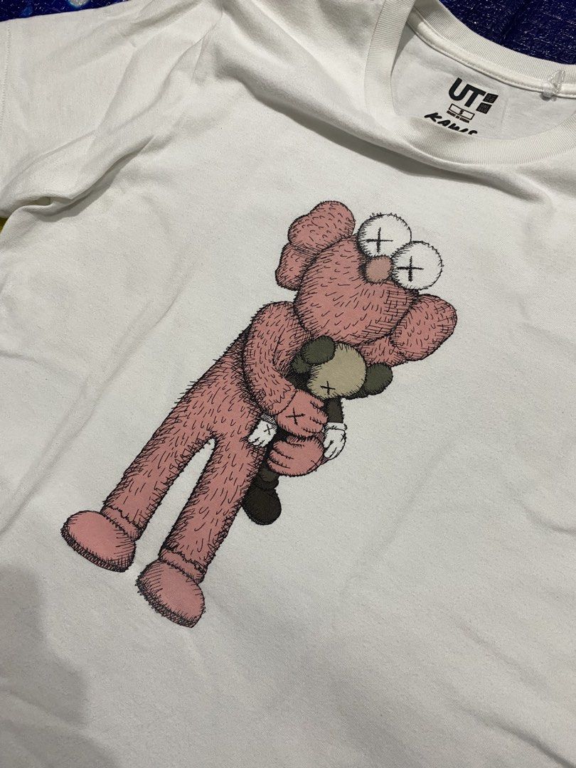 KAWS x Uniqlo Pink BFF Tee (Category: Tshirts & Polo Shirts ) located in Maasin. Submitted by regain_cycle17 (Listing ID 1460690888, Image 3). Description: KAWS x Uniqlo Pink BFF Tee S on tag (Can fit up to Medium size)✅ Excellent condition to as new🔥 21W x 27L 10/10 color rate🤍 super white No hidden issues/flaws❌ Washed and ready to wear♻️ Color may vary due to lights❗️ 450 plus shipping fee✈️💰 MOP: GCash📥 STRICTLY PAYMENT FIRST❗️ 📍SOUTHERN