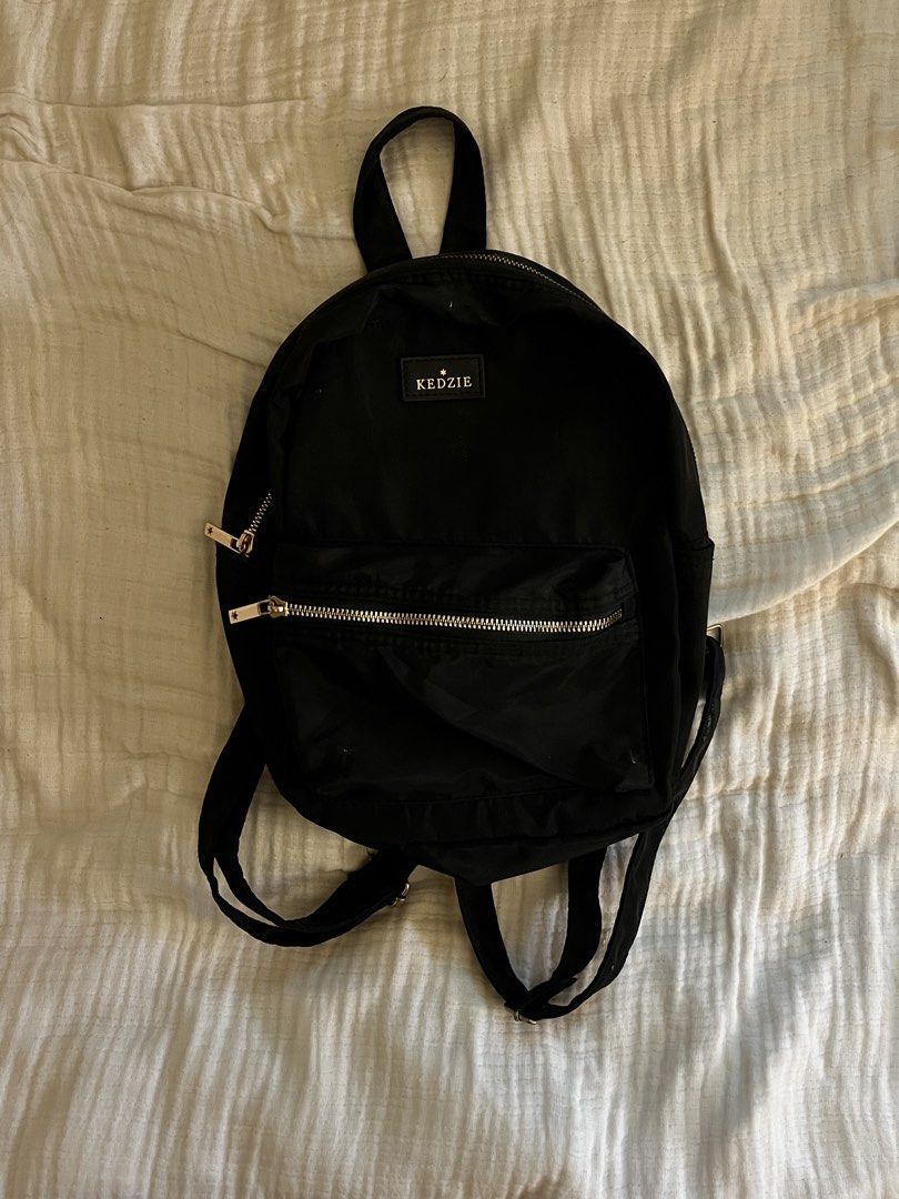 Kedzie Black Mini Backpack (Category: Backpacks) located in Rizal. Submitted by vie_apparel (Listing ID 1460584431, Image 1). Description: - Used only once or twice - Bought in the US - MOP: Gcash, Bank Transfer ‼️Payment First ‼️No Cancellation ‼️Buyer will shoulder the sf.