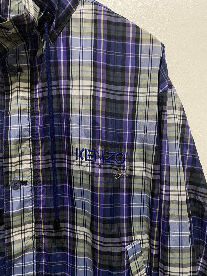 Kenzo Golf Plaid Windbreaker Jacket (Category: Coats, Jackets and Outerwear) located in Cainta. Submitted by mars_olavere (Listing ID 1460636981, Image 3). Description: - Cool Kenzo Golf windbreaker - Classic plaid pattern (blue, purple, green) - Stand-up collar - Elasticated cuffs and hem - Embroidered logo on chest - Perfect for casual wear or a light layer.