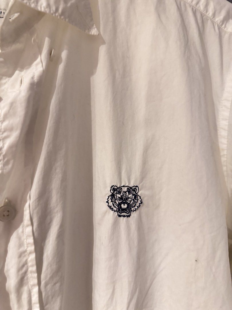 Kenzo White Button Down (Category: Formal Shirts) located in Manila. Submitted by nadinecarlos (Listing ID 1460667938, Image 2). Description: Authentic Dimes: W20.5 x L27.
