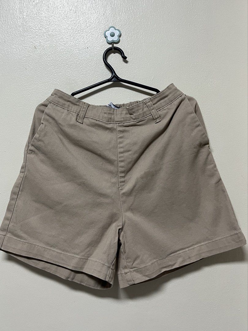 Khaki Elastic Waist Shorts (Category: Shorts) located in Los Banos. Submitted by sashimituna (Listing ID 1460550395, Image 1). Description: - Comfortable khaki shorts - Elastic waistband at the back for a great fit - Two side pockets and one back pocket - Simple and versatile design - Ideal for casual wear.