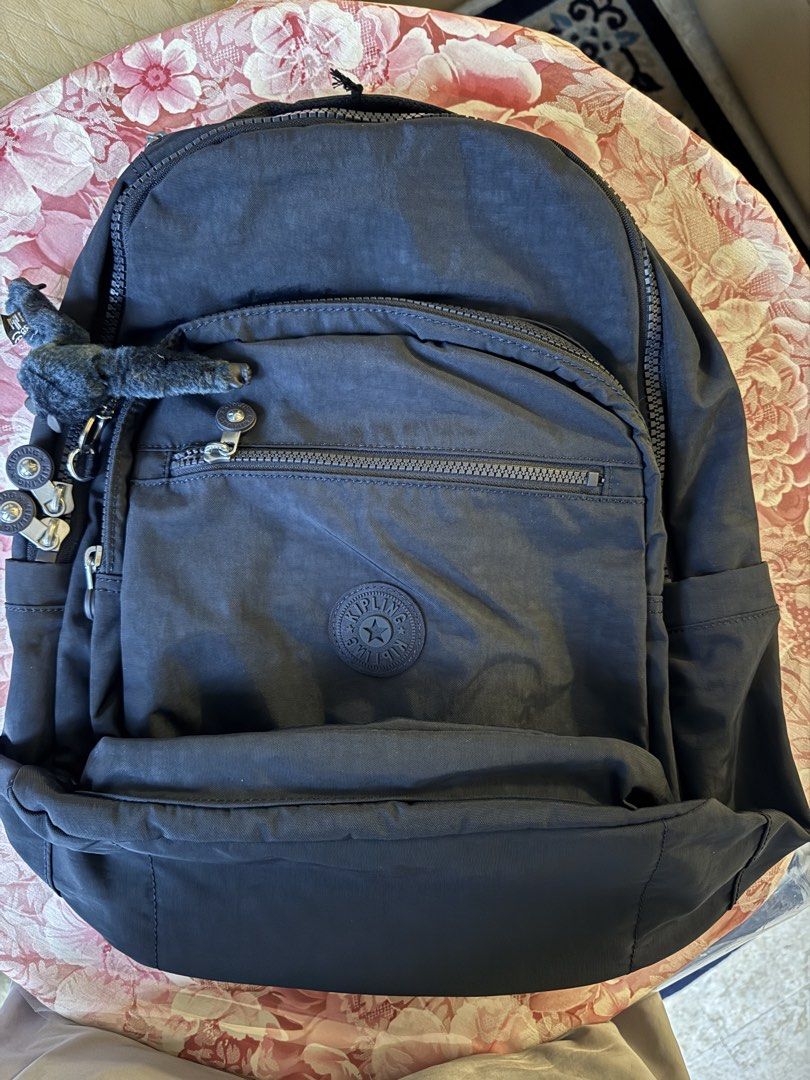 Kipling Back Pack (Category: Shoulder Bags) located in Singapore. Submitted by aeroavanti (Listing ID 1460575469, Image 5). Description: Dark Blue Kipling back pack for ladies. Brand New and still in original packing bought from Amazon at $90.00. In good condition not damage and all zippers working..