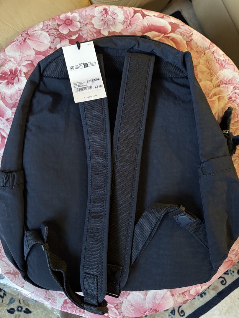 Kipling Back Pack (Category: Shoulder Bags) located in Singapore. Submitted by aeroavanti (Listing ID 1460575469, Image 3). Description: Dark Blue Kipling back pack for ladies. Brand New and still in original packing bought from Amazon at $90.00. In good condition not damage and all zippers working..