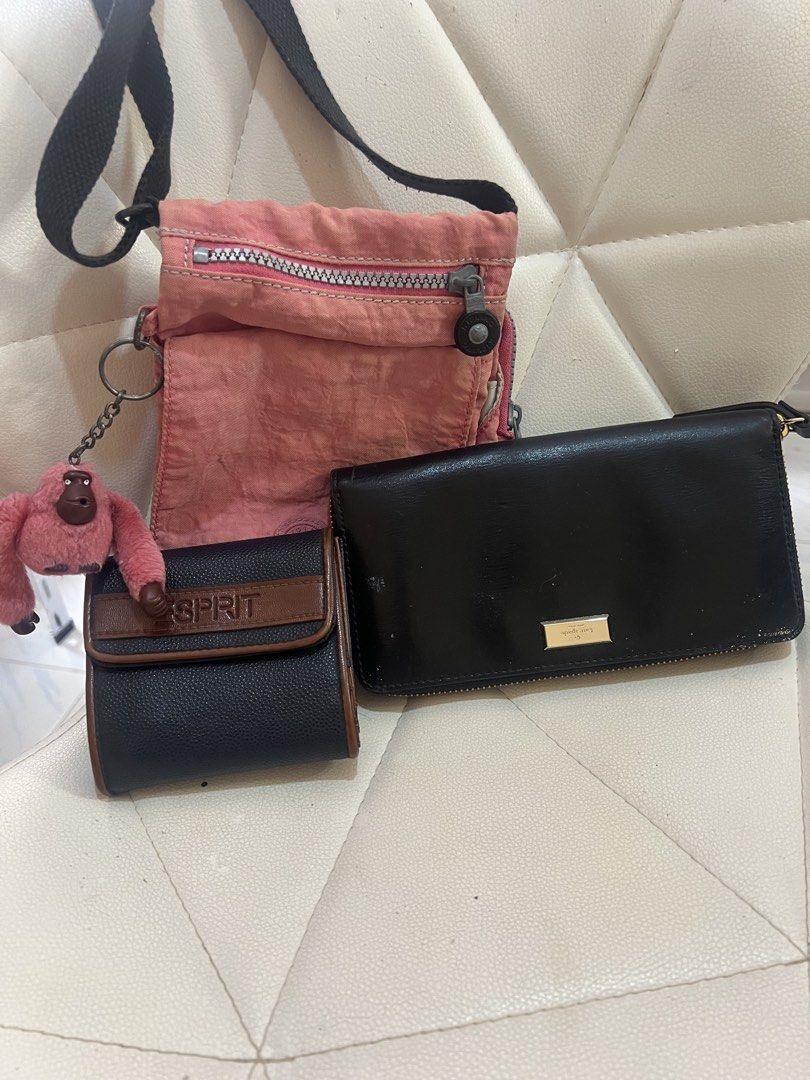 Kipling Bag, Esprit Wallet, Kate Spade Wallet Bundle (Category: Wallets & Card holders) located in Caloocan City. Submitted by kcconstntino (Listing ID 1460529132, Image 2). Description: - Bundle includes 3 bags: pink Kipling crossbody, black Esprit bifold wallet, and black Kate Spade long wallet. - Kipling bag features its signature monkey charm. - Esprit wallet has black exterior with brown trim. - All items are from a smoke-free home. - Ideal 