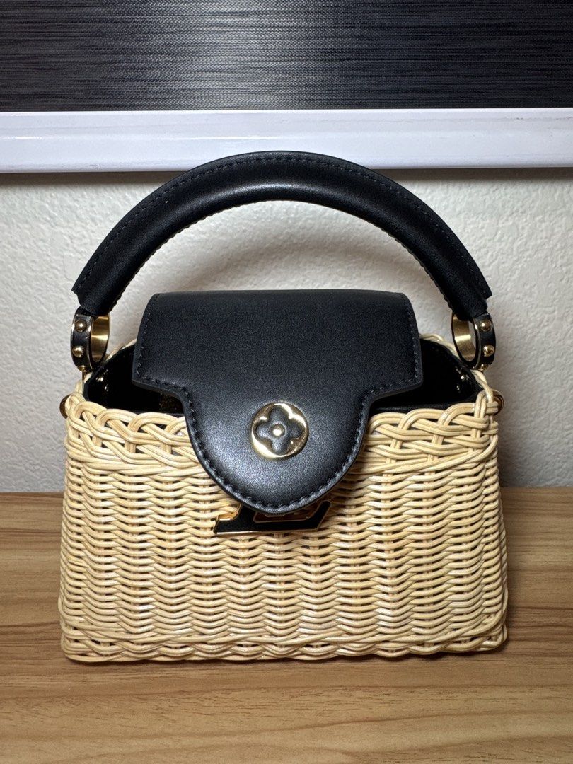 L V Capucines (Category: Luxury Bags & Wallets) located in Abucay. Submitted by miaou_finds (Listing ID 1460626569, Image 2). Description: Hand-picked this pre-loved LV Capucines Wicker because the craftsmanship is just top-tier. Super rare, ultra-chic, and ready for its next home! 🥰 🤍Condition: Excellent ☑️ Microchip 💼 includes strap + dustbag 🏷️ ₱5,500 (neg).