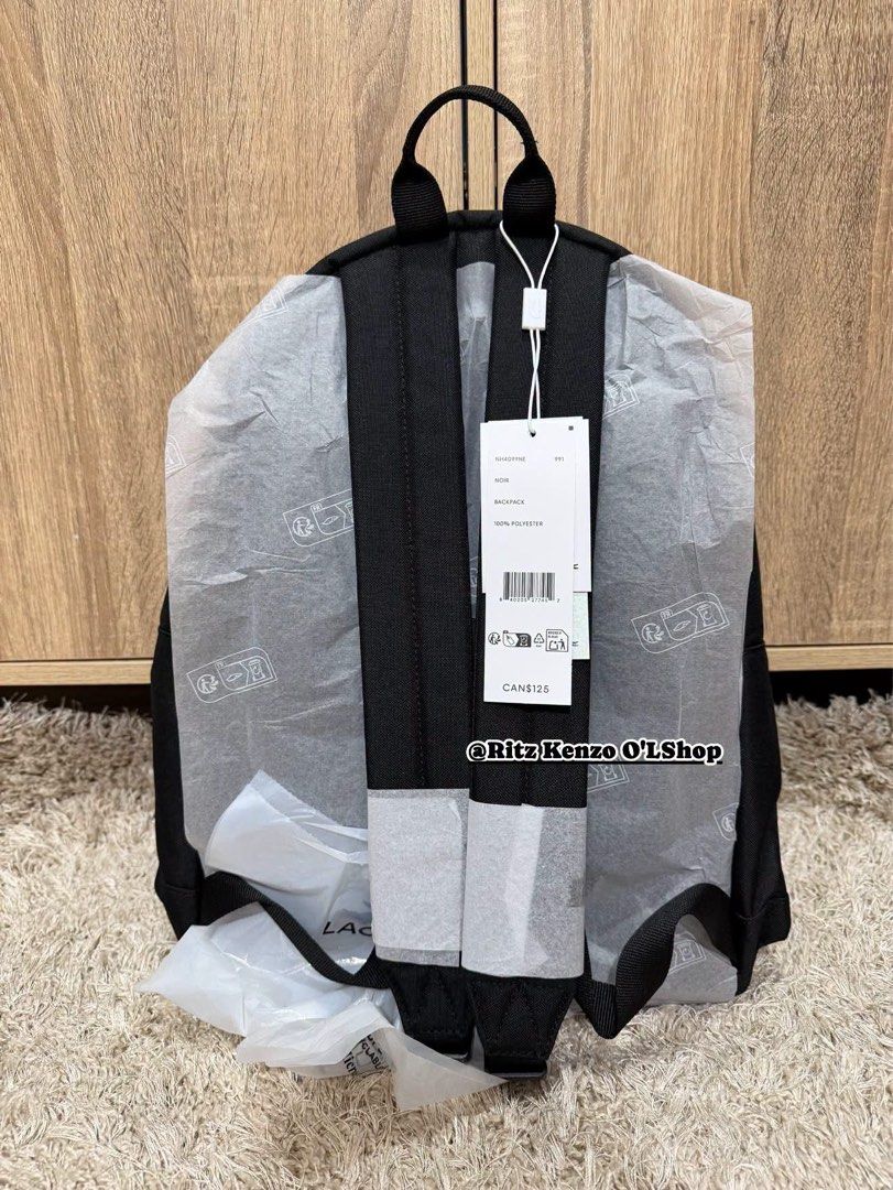 Lacoste Backpack Black Polyester CANS126 (Category: Backpacks) located in Antipolo. Submitted by ritzkenzo_olshop06 (Listing ID 1460538434, Image 2). Description: - Authentic Black Lacoste Backpack - Durable Polyester Material - Zippered Front Pocket for easy access - Spacious Main Compartment with Interior Sleeve - Navy Blue Interior Lining - Brand New with Tags Attached - Ideal for Everyday Use.