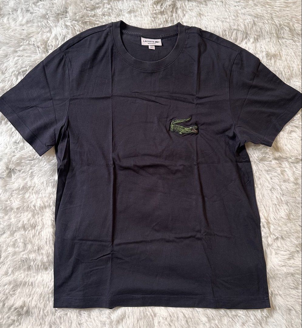 Lacoste big crocs (Category: Tshirts & Polo Shirts ) located in Manila. Submitted by uniqlow717 (Listing ID 1460561072, Image 1). Description: ‼️‼️Declutter Sale! ‼️‼️ Perfect for laid-back fits, quick errands, lounge days, and effortless everyday style. 👕☕ 💫 Condition: Preloved / Very Good Condition / Freshly Washed 📏 Size: Medium (Standard Fit) 💰 Price: ₱1000 📦 Shipping: Lalamove or Grab pick up 💌 DM.