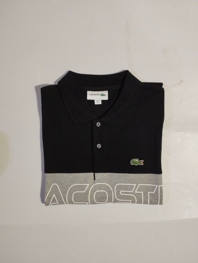 LACOSTE BLACK POLO SHIRT (Category: Activewear) located in Manila. Submitted by apparell (Listing ID 1460525956, Image 1). Description: LACOSTE BLACK POLO SHIRT BRAND NEW CONDITION AUTHENTIC COMPLETE TAGS SIZE SMALL 21X27 NO ISSUE.