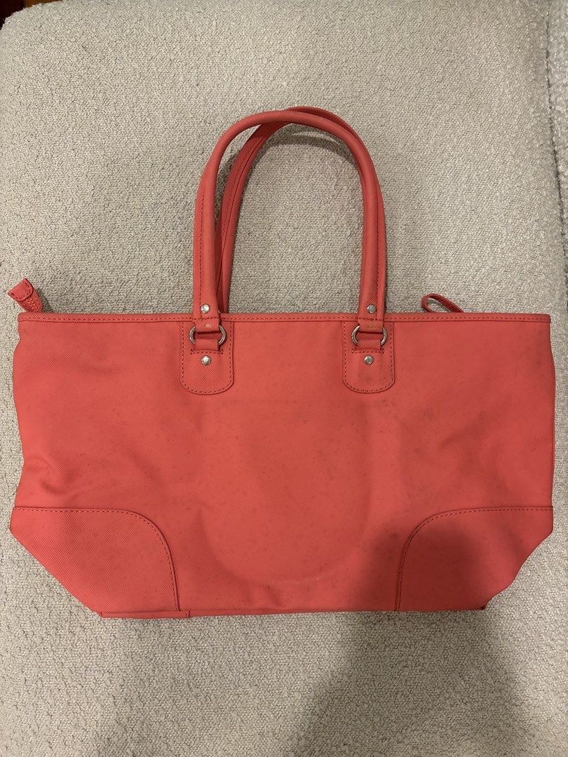 Lacoste Coral Pink Tote Bag (Category: Tote Bags) located in Manila. Submitted by khloesmom (Listing ID 1460609877, Image 2). Description: - Coral pink Lacoste tote bag - Features zippers on both sides - Ideal size for everyday use.