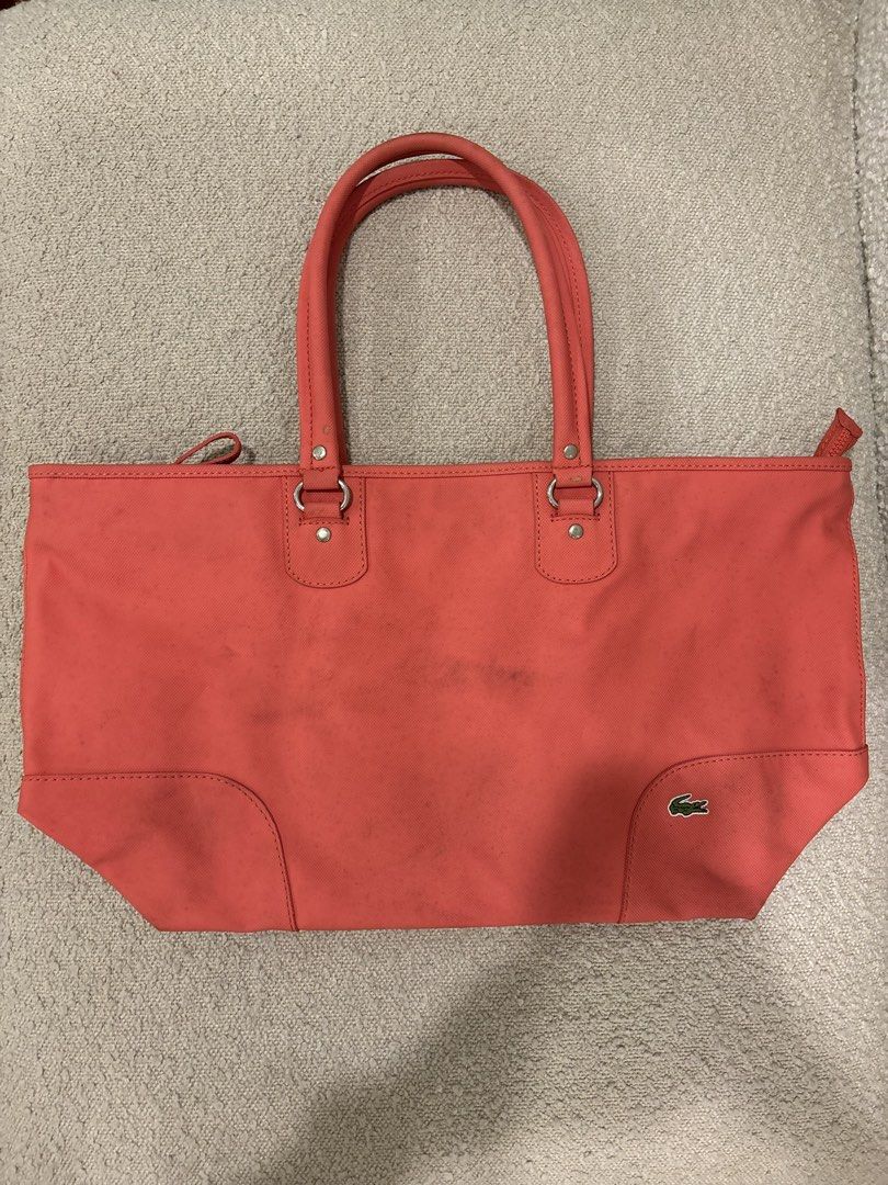 Lacoste Coral Pink Tote Bag (Category: Tote Bags) located in Manila. Submitted by khloesmom (Listing ID 1460609877, Image 1). Description: - Coral pink Lacoste tote bag - Features zippers on both sides - Ideal size for everyday use.