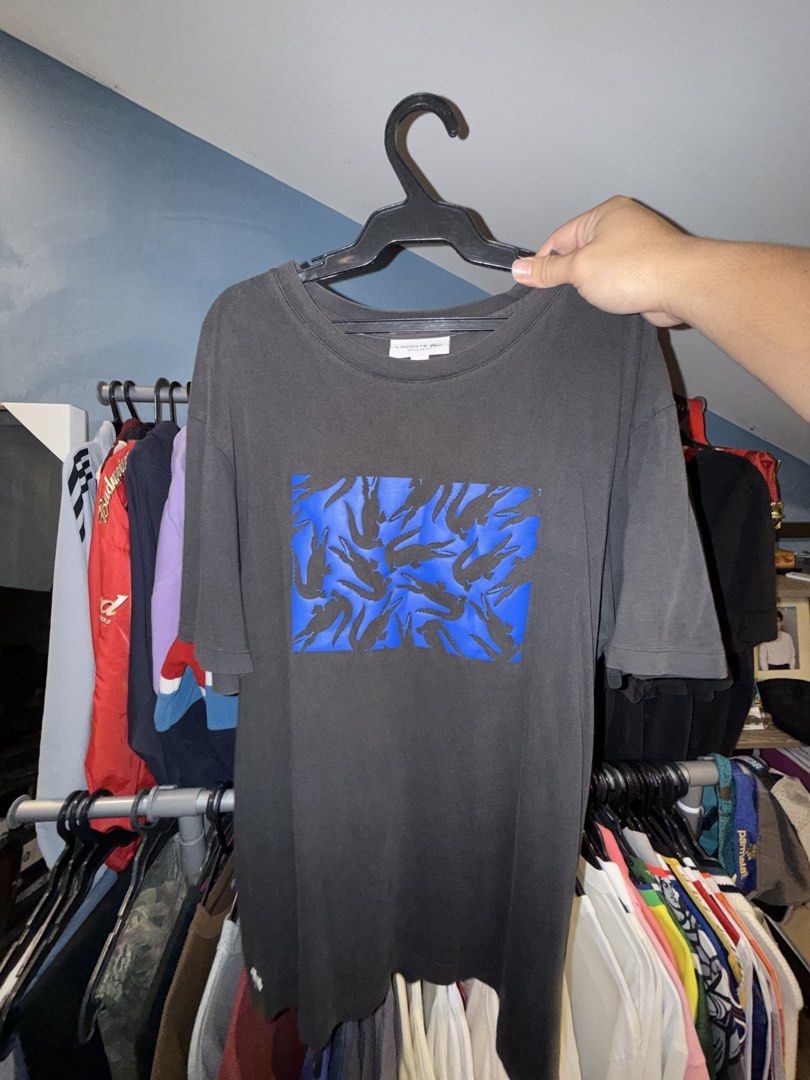Lacoste graphic tee (Category: Tshirts & Polo Shirts ) located in Santa Rosa. Submitted by rgnrvn300 (Listing ID 1460679352, Image 2). Description: Lacoste graphic tee Price: 400 Size: XL Width: 21.5 Length: 28 Color rate: 9/10 Condition: 9.5/10 Issue: none Shipping thru J&T.