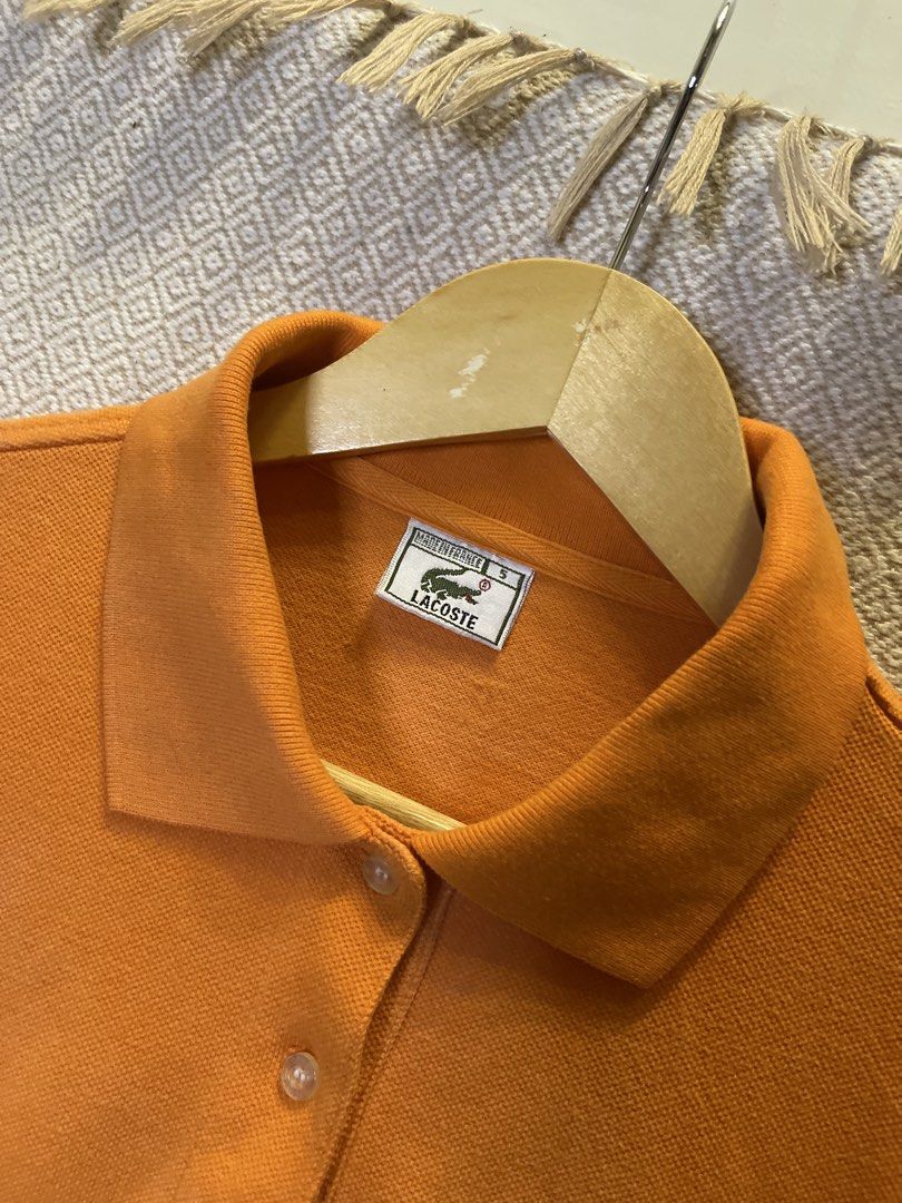Lacoste orrange polo shirt (Category: Shirts) located in Manila. Submitted by hypestock_mnl (Listing ID 1460566419, Image 3). Description: - stylish - perfect for casual wear - great fit - in good condition - minimal signs of usage - 9/10 - money worth! - see pics for details/issue.