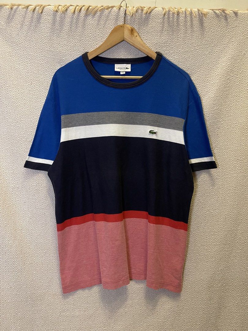 Lacoste stripe tee (Category: Tshirts & Polo Shirts ) located in Manila. Submitted by hypestock_mnl (Listing ID 1460531296, Image 1). Description: - stylish - perfect for casual wear - great fit - in good condition - minimal signs of usage - 9.5/10 - money worth! - see pics for details/issue.