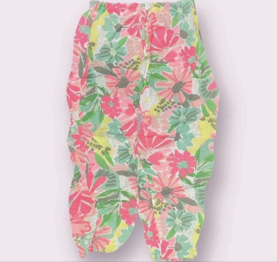 Laila & Lyra Floral Pants 10yo (Category: Babies & Kids Fashion) located in Rizal. Submitted by cassappl (Listing ID 1460708617, Image 1). Description: - Adorable floral print pants - Features pink, green, and yellow flowers with leaves - Comfortable elastic waistband - Lightweight fabric, ideal for warm weather - Versatile for pairing with simple tops - Perfect for casual outings.