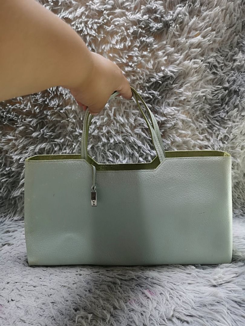 Leather Rectangular Double Loop Handle Hand Bag (Category: Purses & Pouches) located in Santa Cruz. Submitted by jmy_surplus.2 (Listing ID 1460596886, Image 3). Description: Size ; L - 8 W - 14.4 Color ; Grey Blue Type ; Hand bag Brand ; No brand Material ; Leather Style ; Grey Blue Leather Hand bag LR 165 JMY 1 Batch #219.
