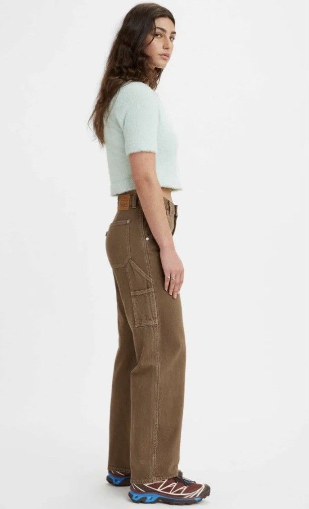 Levi's Dad Utility Brown Pants (Category: Jeans) located in Pasig City. Submitted by brownbagph (Listing ID 1460608005, Image 3). Description: - 95% cotton / 5% recycled cotton - Relaxed fit / mid-rise - Zip fly - 6 pocket construction - Brown Garment Dye - 24 (width) x 28 (length) on tag but can fit 27/28 inches waist.