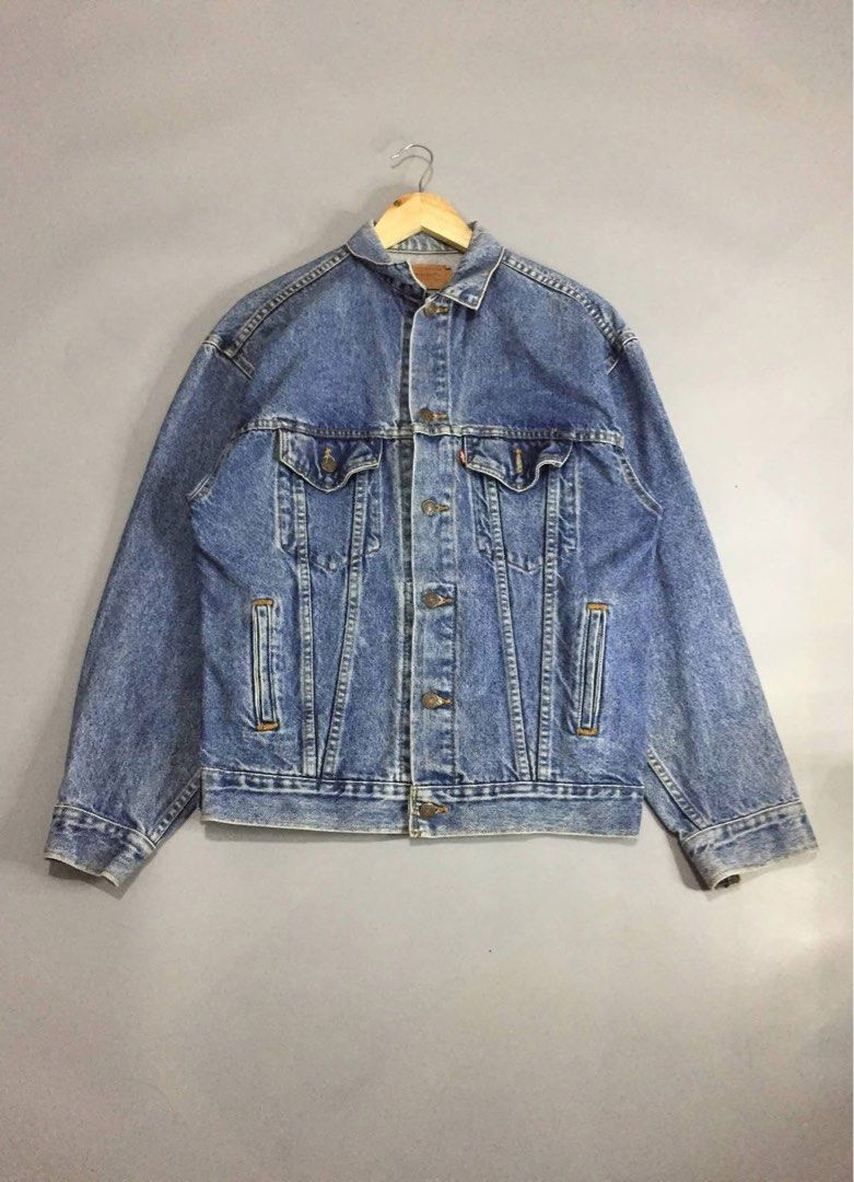Levi's Denim Jacket - Acid Wash - Size 11 (Category: Coats, Jackets and Outerwear) located in Batangas. Submitted by franzbucal (Listing ID 1460658052, Image 1). Description: - Classic Levi's denim jacket - Acid wash finish - Two chest pockets with button closures - Button front and cuffs - Estimated size: 11 - Versatile staple piece for any wardrobe - Great for layering.