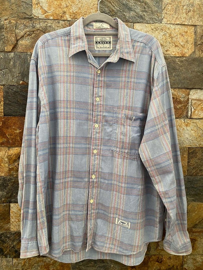 LEVIS Vintage 90s Plaid Long sleeve (Category: Activewear) located in Manila. Submitted by asiongmx (Listing ID 1460587176, Image 1). Description: LEVIS Vintage 90s Plaid Long sleeve Made in USA Original Size M on tag Can be fit to L Personal item A collector's item Excellent condition Quezon City Area Decluttering.