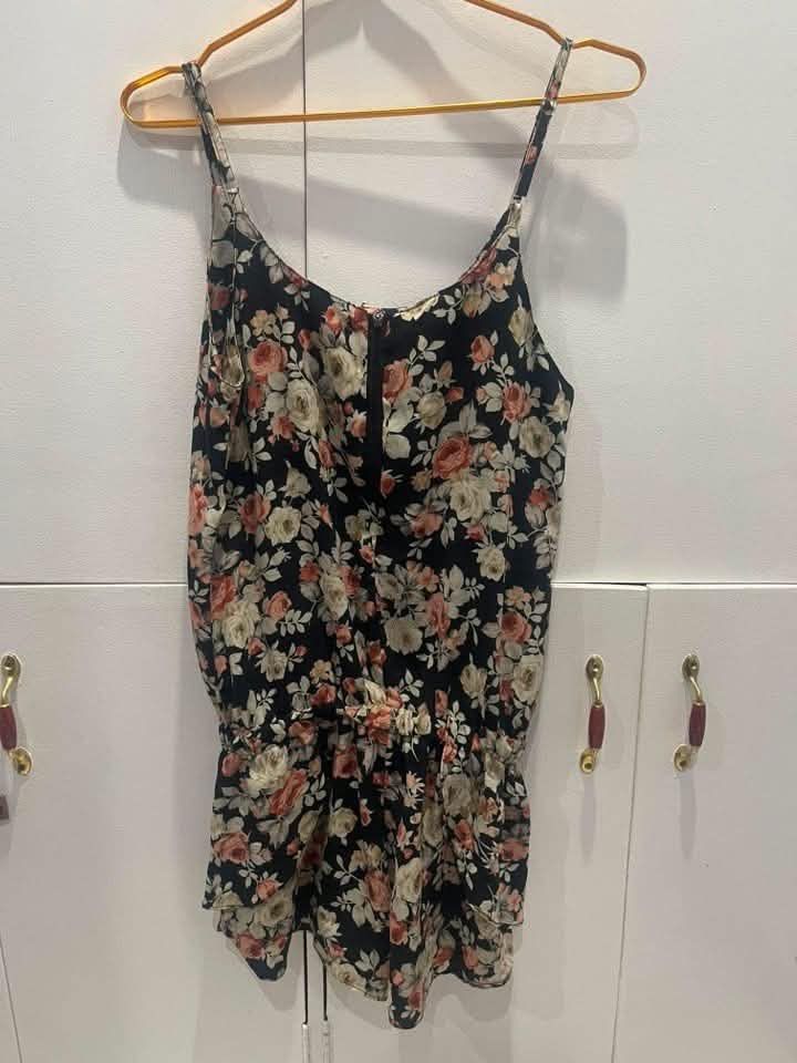 L&F Floral Print Romper Size M (Category: Rompers) located in Taguig. Submitted by monethambas (Listing ID 1460679902, Image 1). Description: - Cute floral print romper from L&F - Spaghetti straps - Drawstring waist - Front zipper closure - Ideal for casual outings or beach days - Comfortable and stylish.
