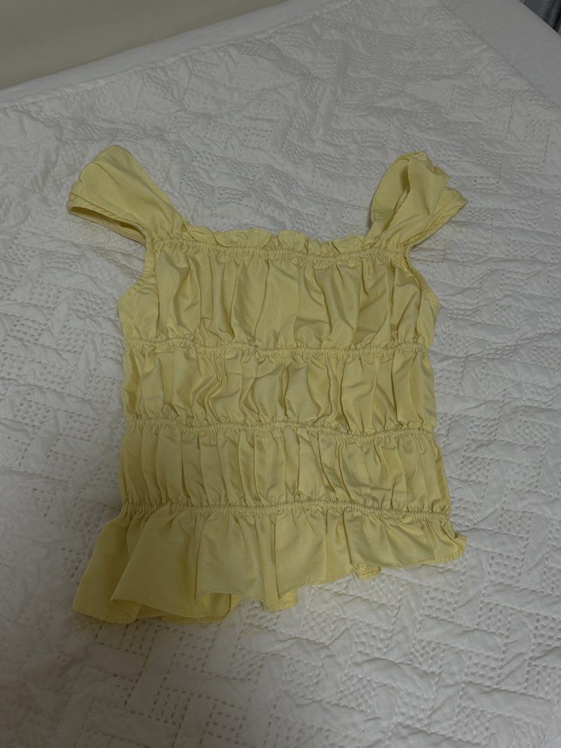 libé yellow ruched top (Category: Blouses) located in Quezon City. Submitted by seasaltspanish (Listing ID 1460703998, Image 1). Description: • fits XS-S frames • super stretchy • vietnamese brand.