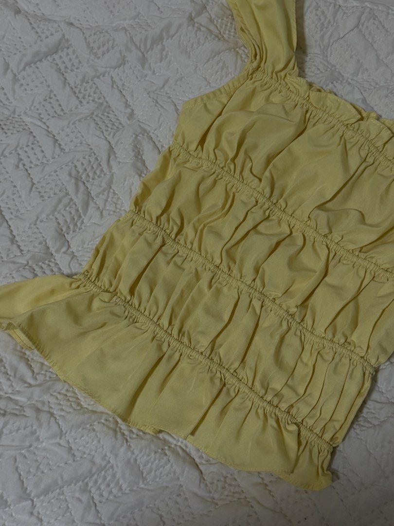 libé yellow ruched top (Category: Blouses) located in Quezon City. Submitted by seasaltspanish (Listing ID 1460703998, Image 3). Description: • fits XS-S frames • super stretchy • vietnamese brand.