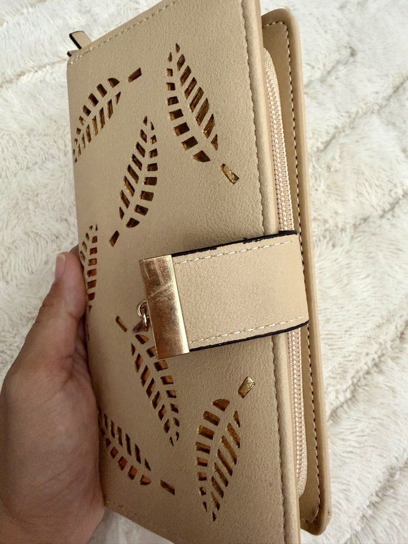 Light brown wallet (Category: Wallets & Card holders) located in Caloocan City. Submitted by swiftgem.2e0efc (Listing ID 1460558924, Image 2). Description: Brand new. No brand.