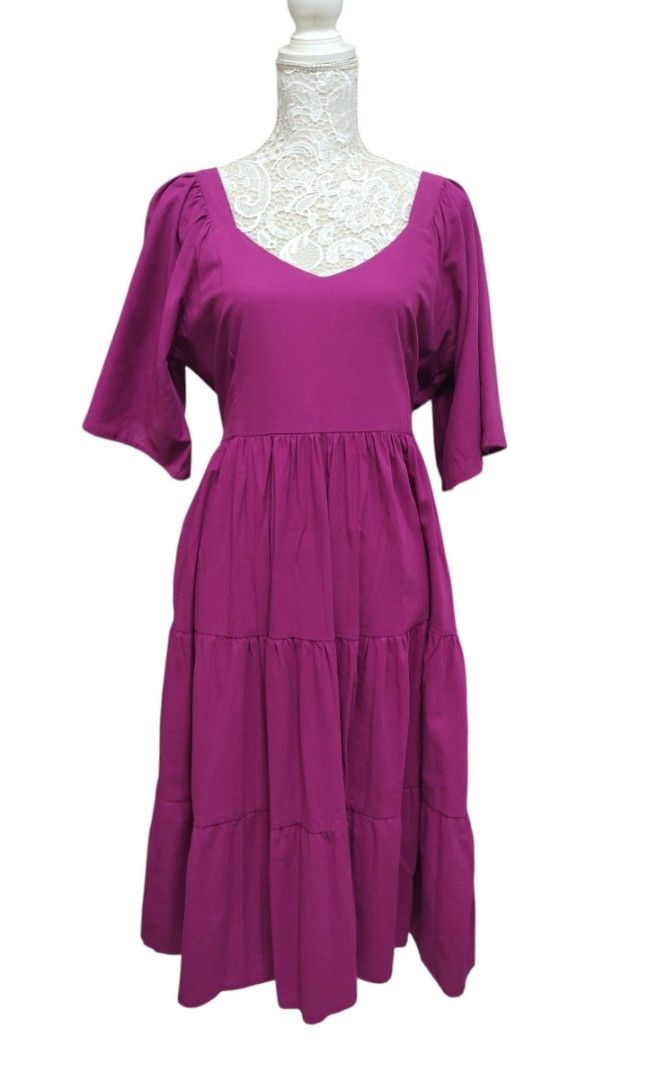 Linen Tiered Midi Dress (Category: Dresses) located in General Trias. Submitted by yjcollections (Listing ID 1460634424, Image 1). Description: Material: Linen Color: Magenta Size: Can fit from Large - 2XL Description: With two side pockets and straps. (**Can be worn either V-neck or Square Cut) ________________________________________________________ Location: General Trias, Cavite Mode of payment: GCash Shipping: 🚚LBC (Shipping fee will depend