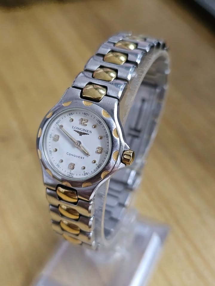 Longines Conquest 1991 Watch Two-tone Quartz (Category: Luxury Watches) located in Caloocan City. Submitted by yatsbatoyskie (Listing ID 1460708079, Image 2). Description: Longines Conques - White dial - Gold-tone hands and markers - Two-tone stainless steel and gold-tone bracelet - Gold-tone bezel -Quartz Movement meetup or via lalamove caloocan sm grand monumento meetup .