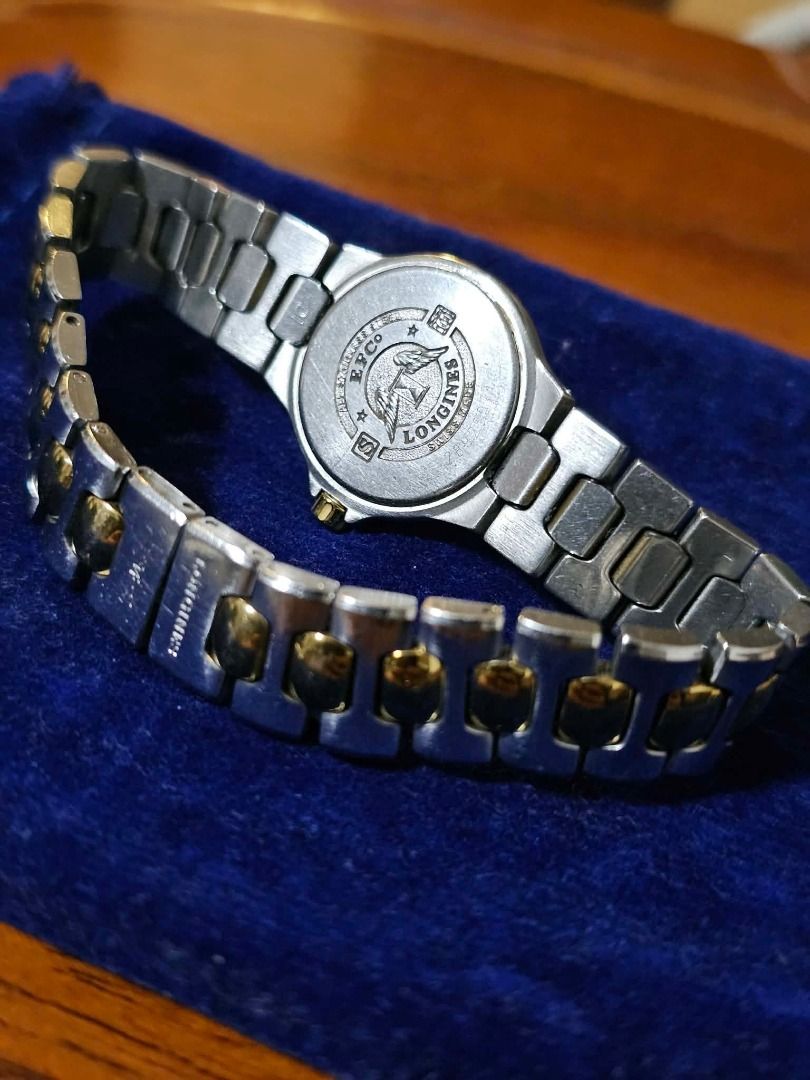 Longines Conquest 1991 Watch Two-tone Quartz (Category: Luxury Watches) located in Caloocan City. Submitted by yatsbatoyskie (Listing ID 1460708079, Image 3). Description: Longines Conques - White dial - Gold-tone hands and markers - Two-tone stainless steel and gold-tone bracelet - Gold-tone bezel -Quartz Movement meetup or via lalamove caloocan sm grand monumento meetup .