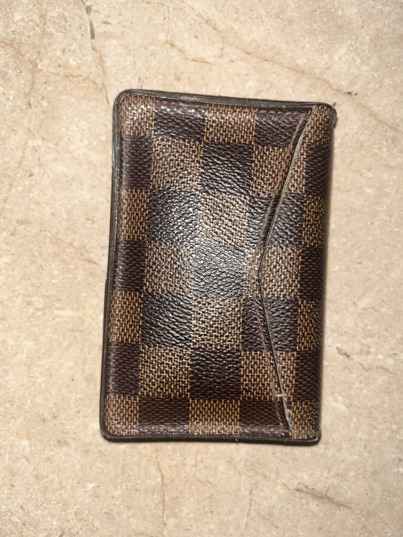 Louis Vuitton Damier Ebene Card Holder (Category: Luxury Bags & Wallets) located in Makati City. Submitted by aliyahprieto949 (Listing ID 1460630089, Image 2). Description: - Authentic Louis Vuitton card holder - Classic Damier Ebene canvas - Slim and pocket-friendly design - Shows some signs of wear on edges/corners - Plenty of life left, great for card organization.